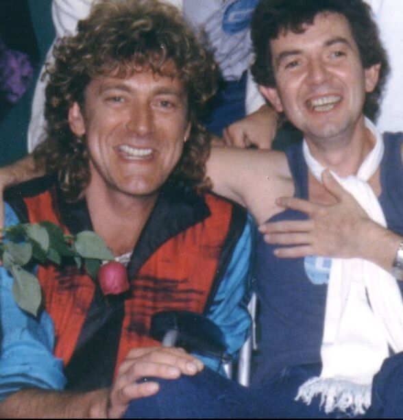 Mark Bowman Images- Ronnie Lane and Robert Plant with Bucks Burnett 1985