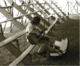 JFAM Photo - pg 55 NOT Ronnie Lane Passing Show Who is this- guitar bleachers photo credit-