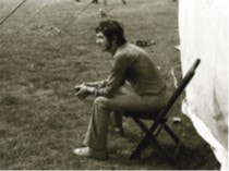 ​JFAM Photo - pg 57 Ronnie Lane alone on chair Slim Chance Passing Show BW photo credit-