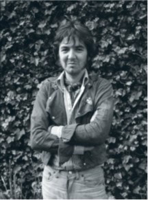 JFAM Photo - pg 62 Ronnie Lane Slim Chance Passing Show alone arms folded BW photo credit-