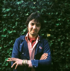 JFAM Photo - pg 62 Ronnie Lane Slim Chance Passing Show alone arms folded color photo credit-