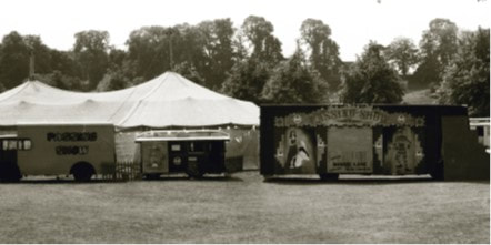 JFAM Photo - pg 74 75 Ronnie Lane Slim Chance Passing Show tents and caravan BW photo credit-