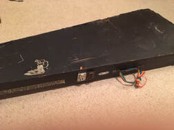 Ronnie Lane - Zemaitis Electric Black Bass -closed coffin guitar case close up