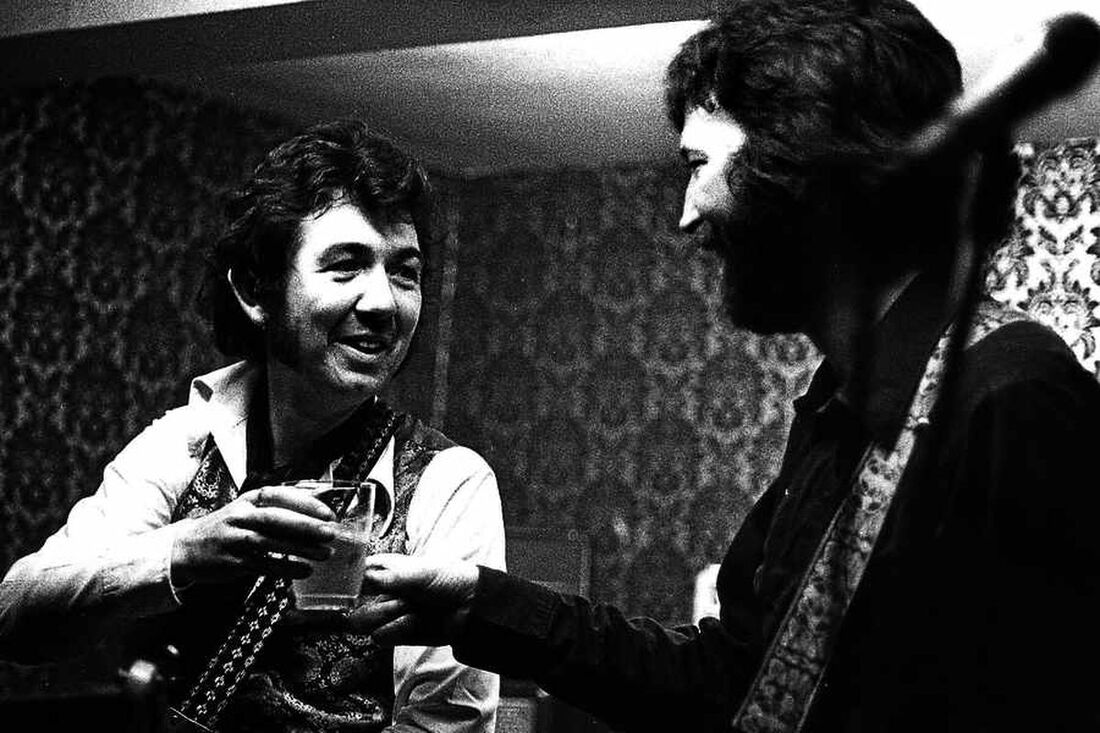 Ronnie Lane and Eric Clapton - March 4, 1977 at the Drum & Monkey at Bromlow -photo credit Dave Bagnall