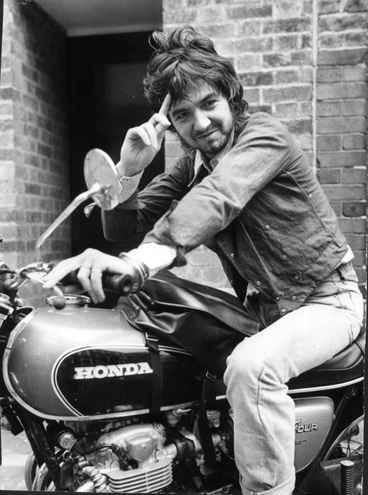 Ronnie Lane on a motorcycle